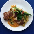 Cedar pan smoked, procuitto wrapped, cumin seared porkloin with a roasted tomatillo and yellow pepper coulis. Asparagus saute with caramelized onion and golden beet julienne.