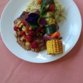 Cajun dusted Veal scallopini with raspberry tropical fruit salsa. Lemon zest brown rice pilaf. Grilled vegetable towers.
